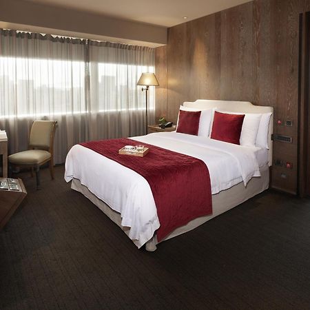 Palais De Chine Hotel Tajpej Kültér fotó A bedroom at the hotel