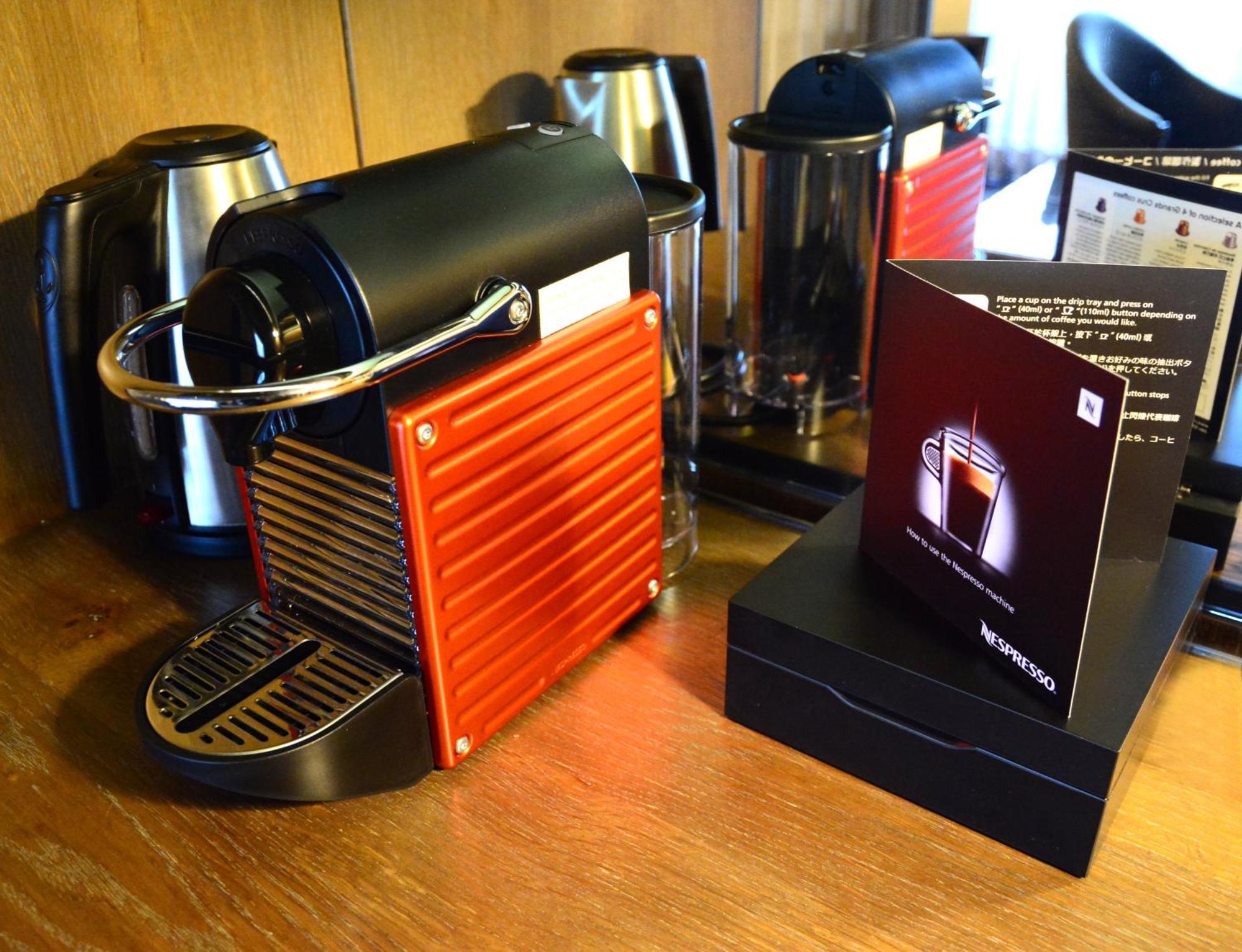 Palais De Chine Hotel Tajpej Kültér fotó A Nespresso machine