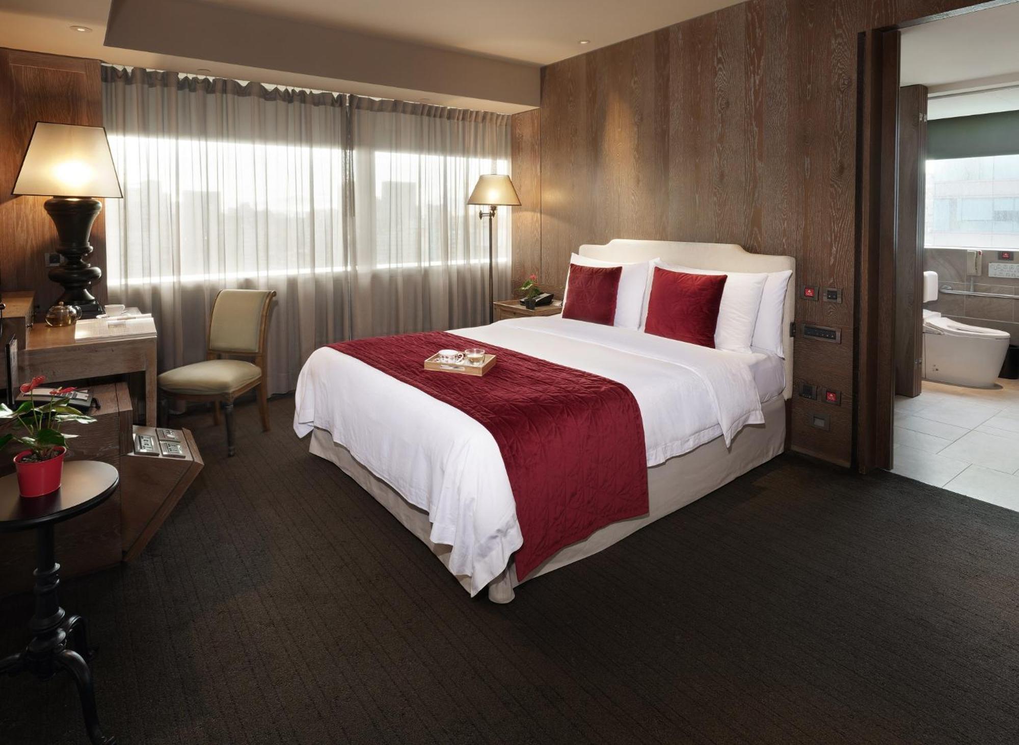 Palais De Chine Hotel Tajpej Kültér fotó A bedroom at the hotel